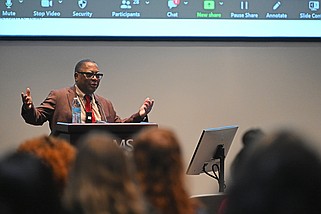 Mel Mann, a leukemia survivor, talks about his experience Wednesday at the UAMS Winthrop P. Rockefeller Cancer Institute in Little Rock..(Arkansas Democrat-Gazette/Staci Vandagriff)